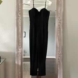 Amanda Uprichard Black Jumpsuit with pockets. Size small.